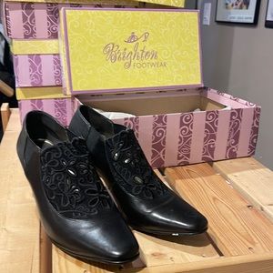 Stunning black leather and lace booties. Very very good condition